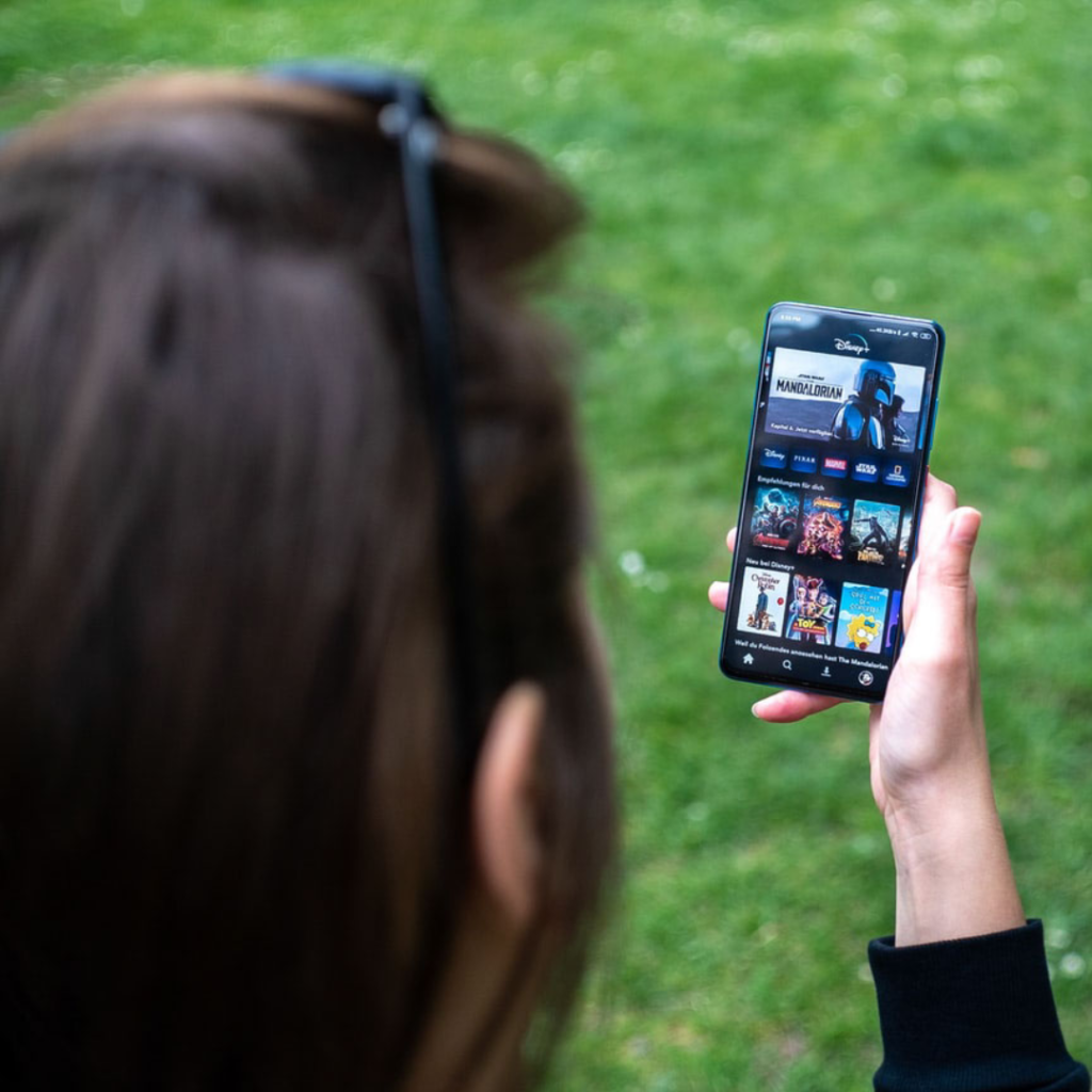 Woman staring at phone screen