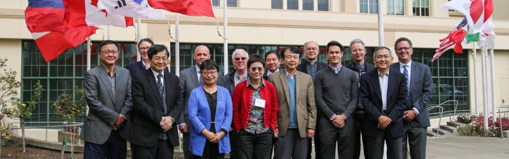 Participants and International Flags of the China Forum Seminar on Humanities Education for a Global Era