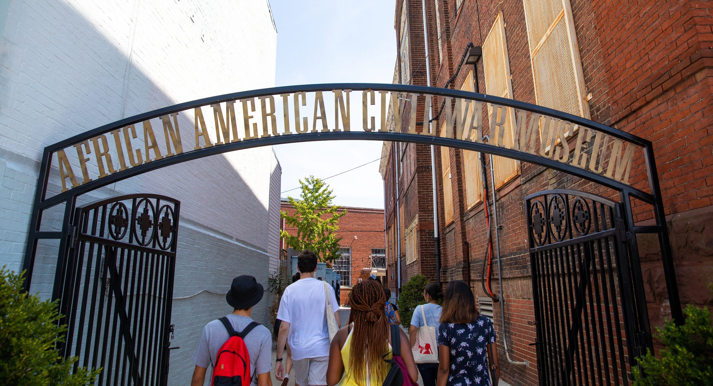 Georgetown University students enter the African American Civil War Museum, as part of the neighbourhood tour exploring the landmarks of Washington DC