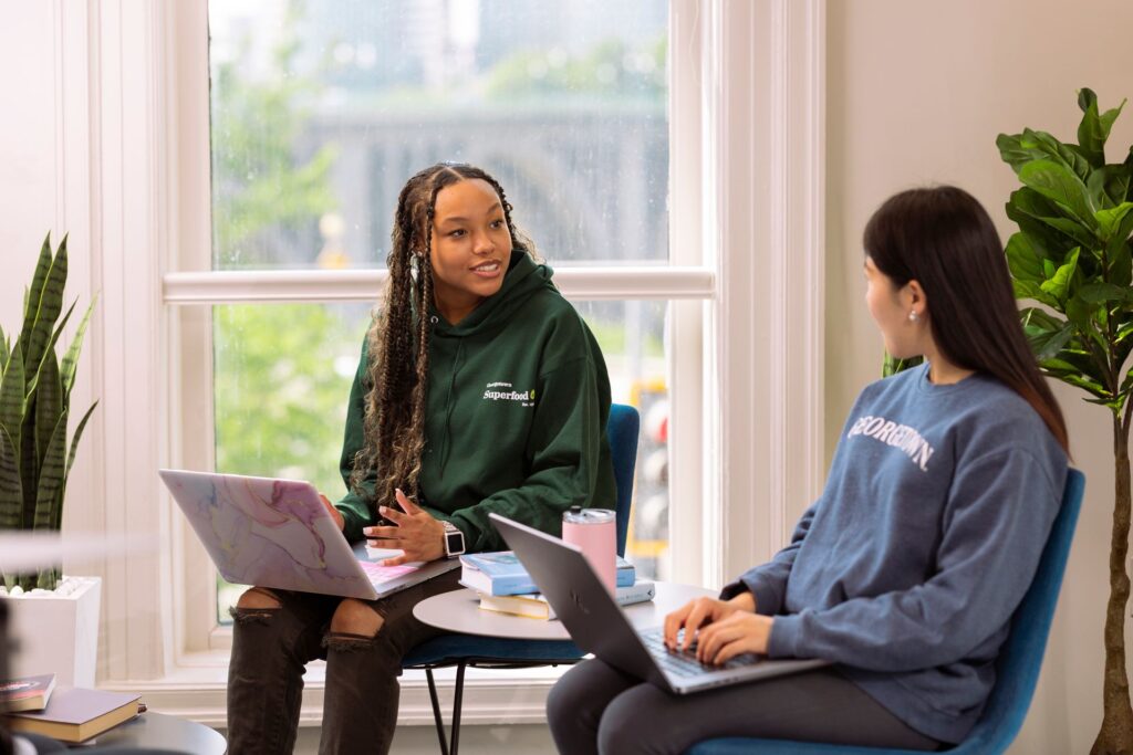 students in class, having a discussion