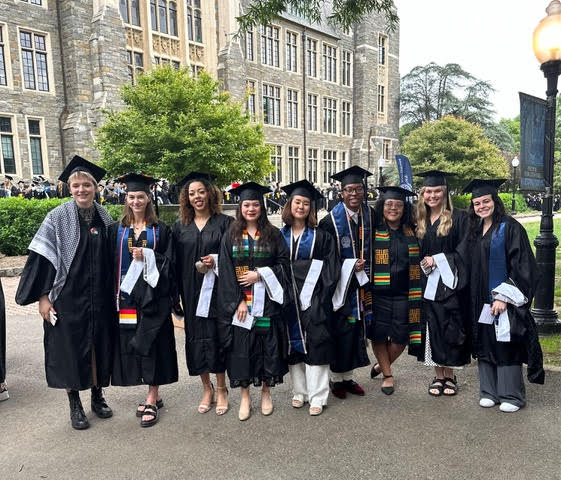 ENPH graduates wearing commencement Caps and Gowns