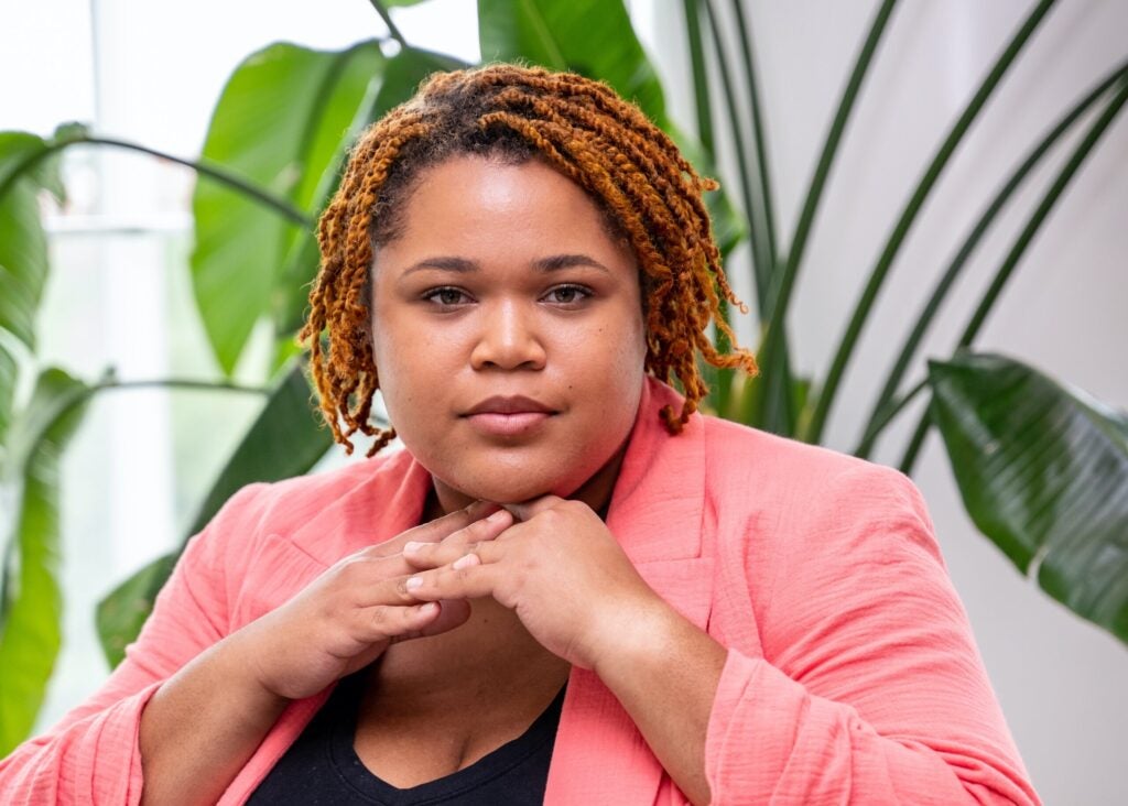 Headshot of Denelle Joynes in a Pink Blazer