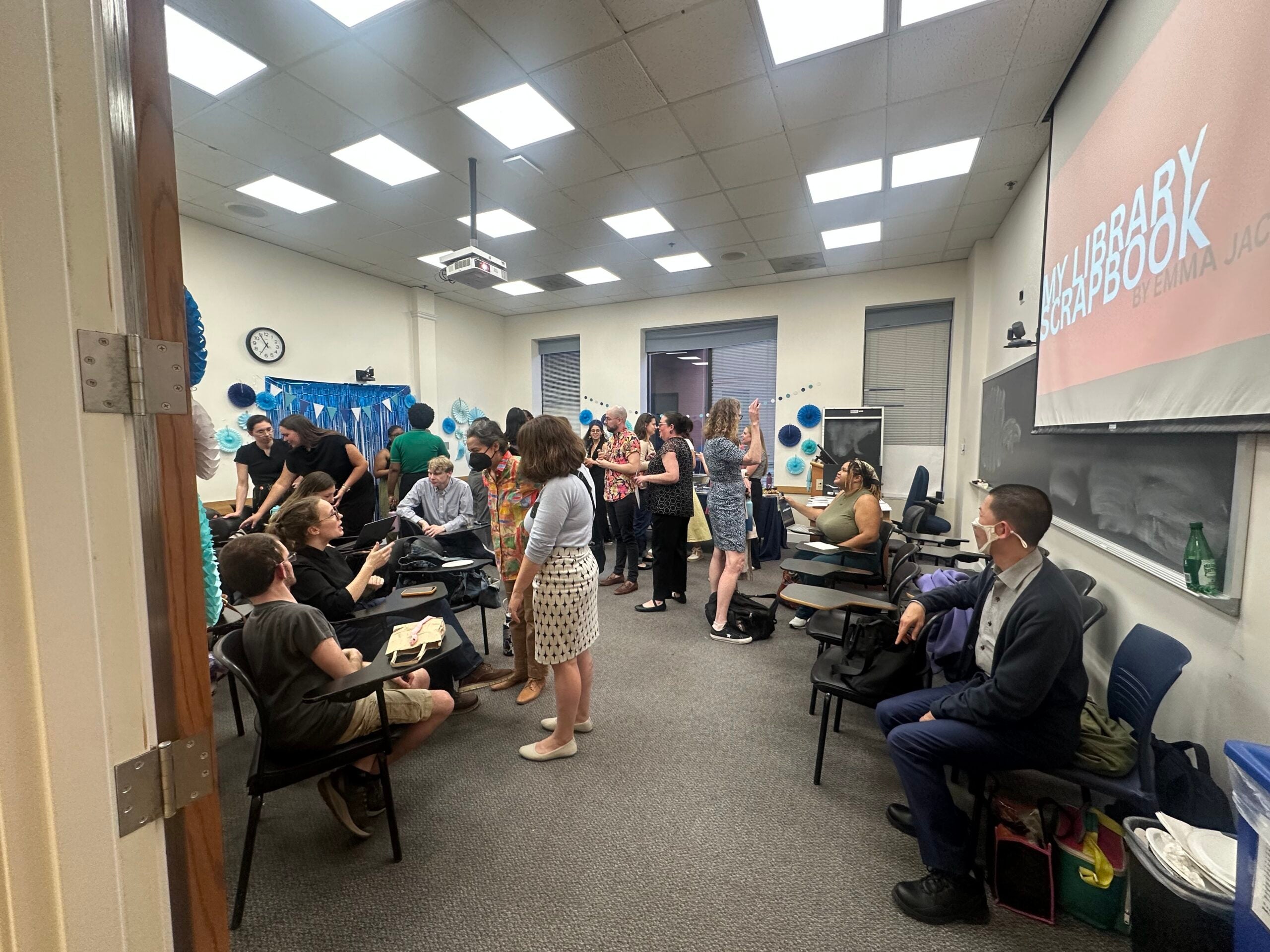 Celebrants gathered, talking and laughing at the interpsaces launch party